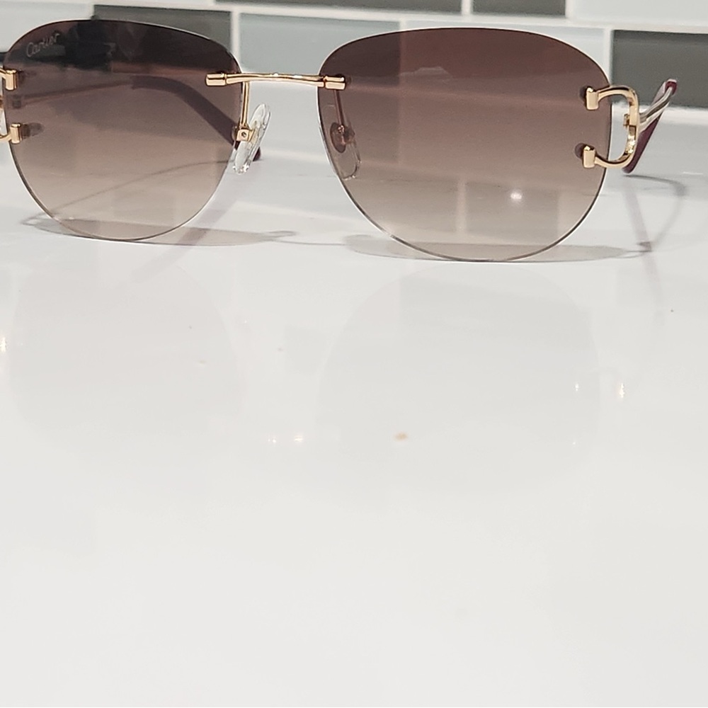 Cartier wires gold with Hennessy tint
